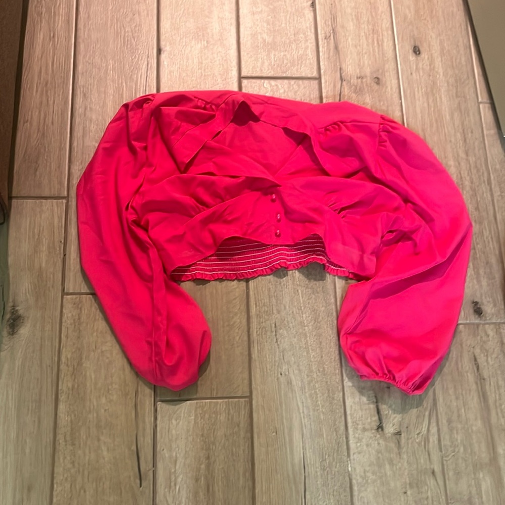 Pink crop top with long sleeves